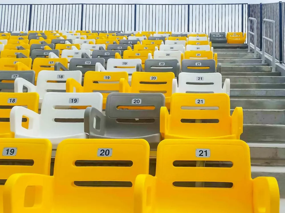 Custom stadium seats with backs.