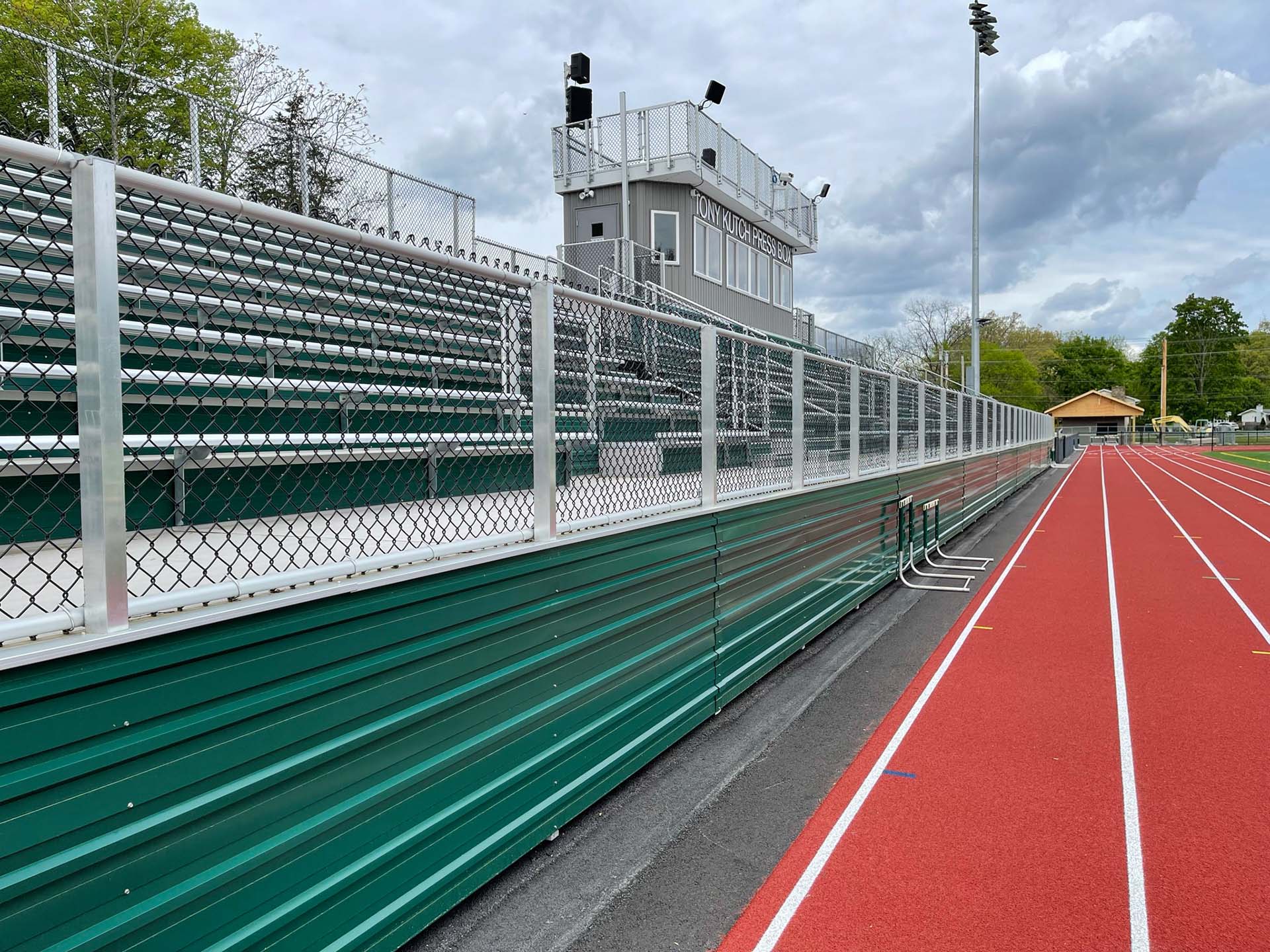 A large aluminum closure panel, complete with aluminum deck railing.