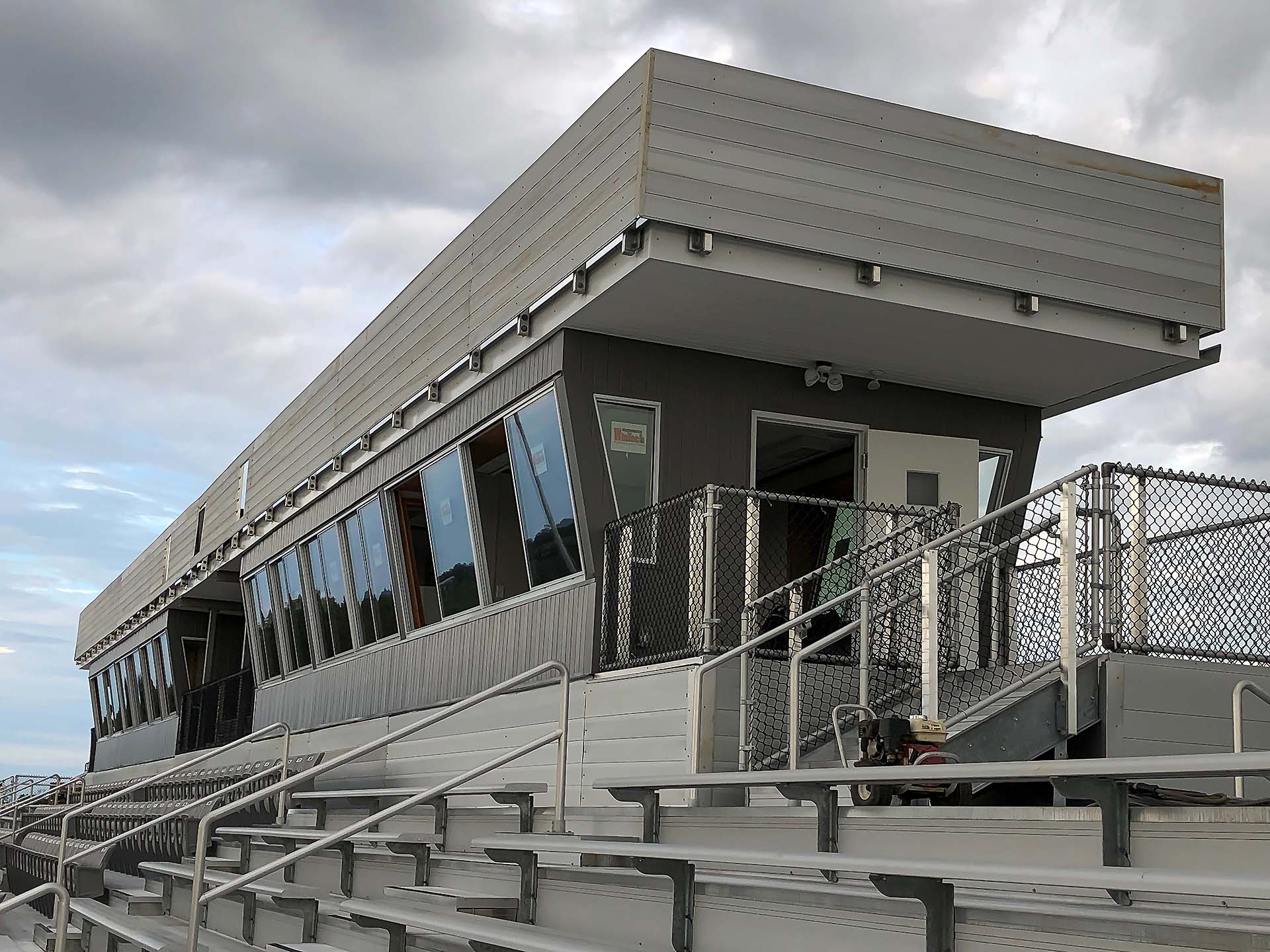 Side-view of press box, complete with aluminum rail.