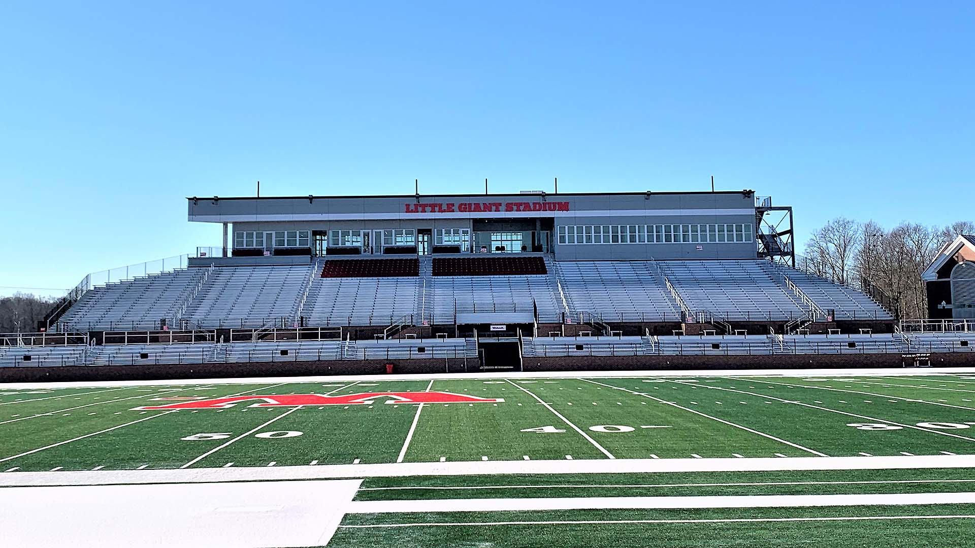 Football stadium bleachers at Wabash College, featuring an I-Beam grandstand with a press box.