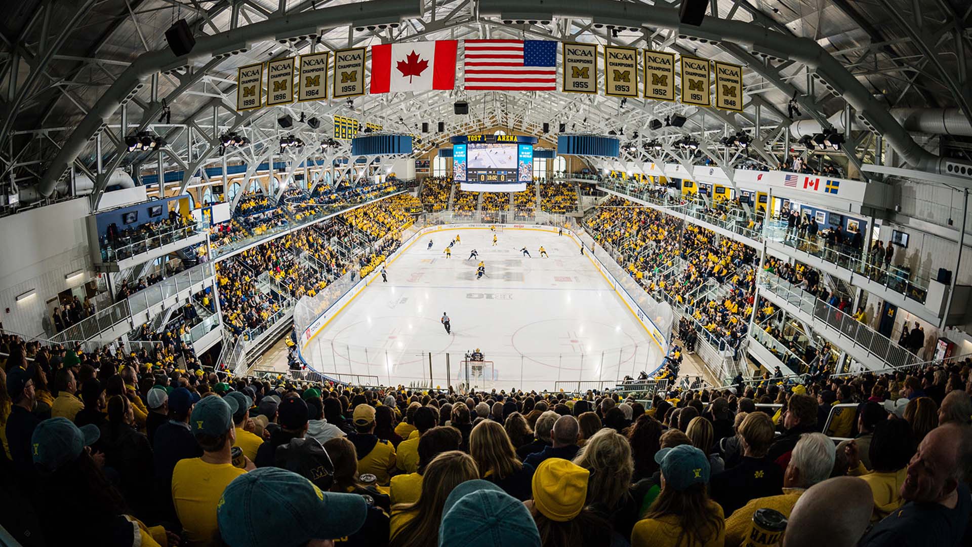 Alternate view of arena seating filled with fans at Yost Ice Arena.