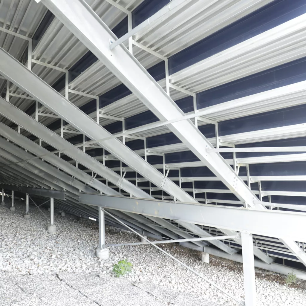 A view of an I-Beam Grandstand structure from below the decking system.