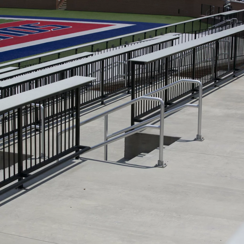 Aluminum rail attached to the grandstands in Whitney Hancock Stadium.